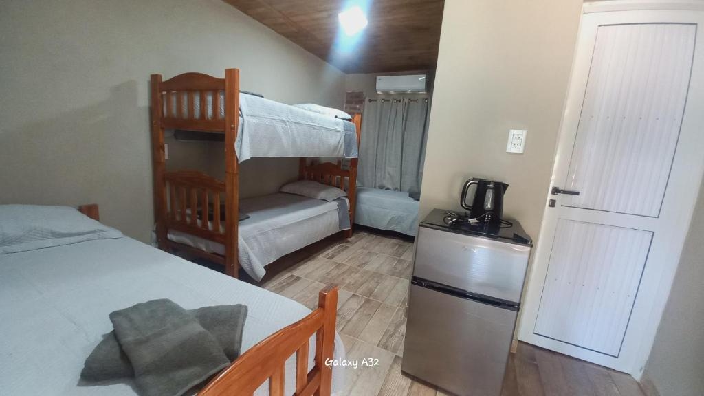 Postel nebo postele na pokoji v ubytování Alojamiento Pytu'u Pora