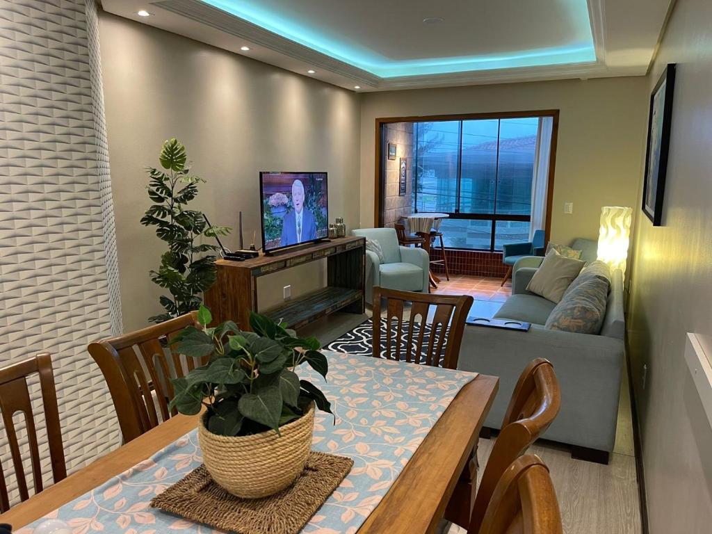 Μια τηλεόραση ή/και κέντρο ψυχαγωγίας στο Apto 4D Frente Beira Mar