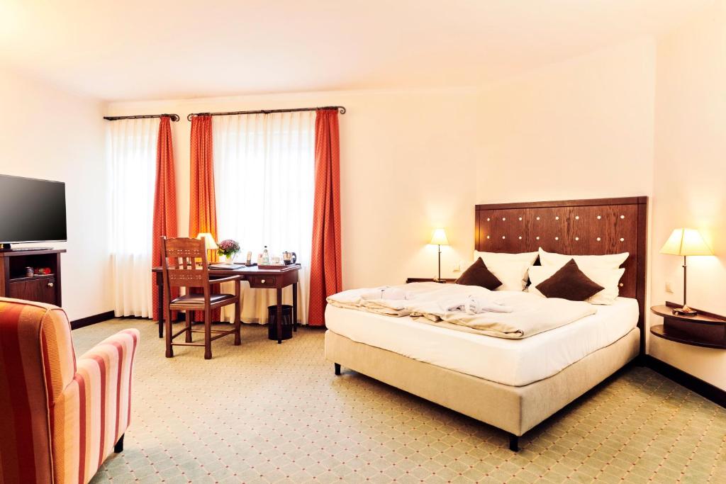 Postel nebo postele na pokoji v ubytování Best Western Soibelmanns Lutherstadt Wittenberg