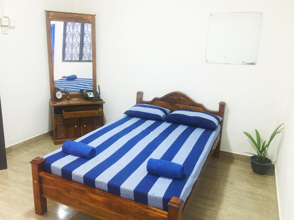 Postel nebo postele na pokoji v ubytování SECRET RELAX INN Hotel & Guest House