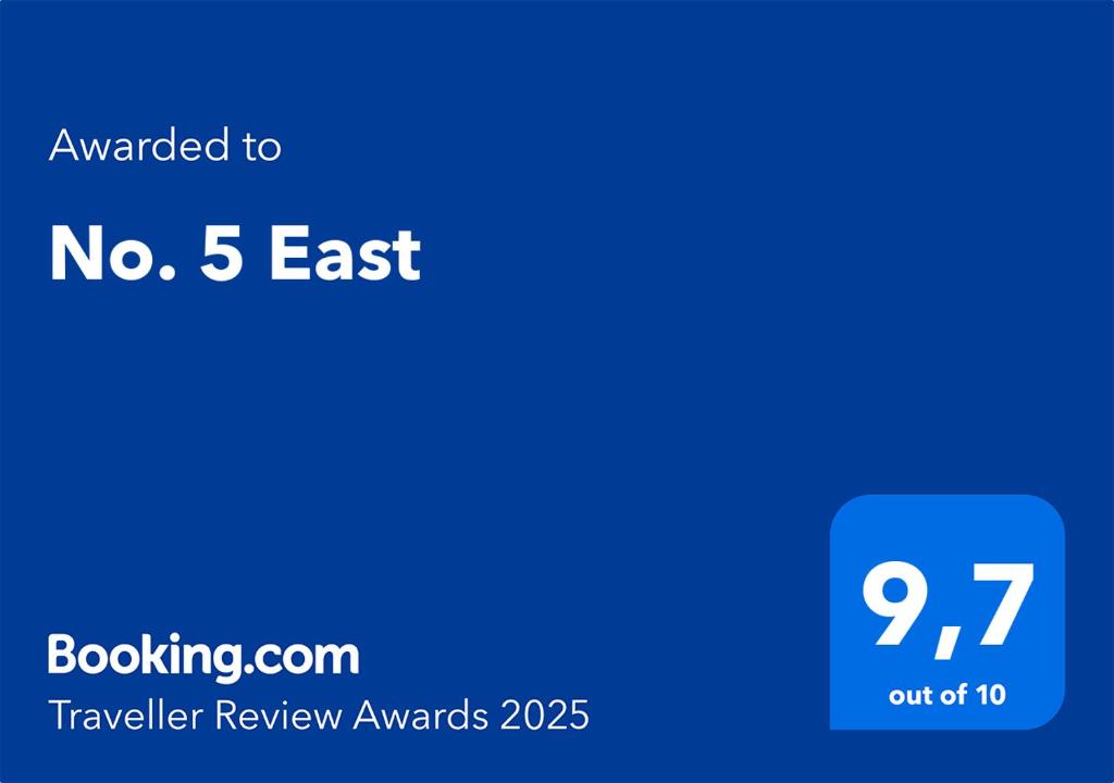 a blue text box with the words no east and a blue square with at No. 5 East in Winnipeg