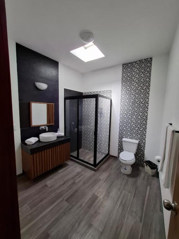 Koupelna v ubytování Hotel Aquiles
