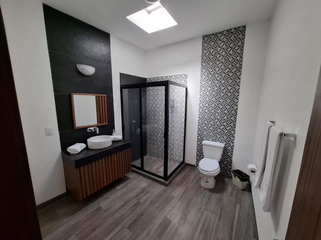 Koupelna v ubytování Hotel Aquiles