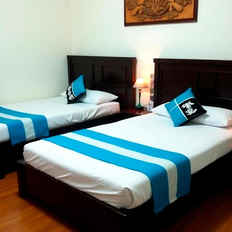 Postel nebo postele na pokoji v ubytování Ananda Retreat