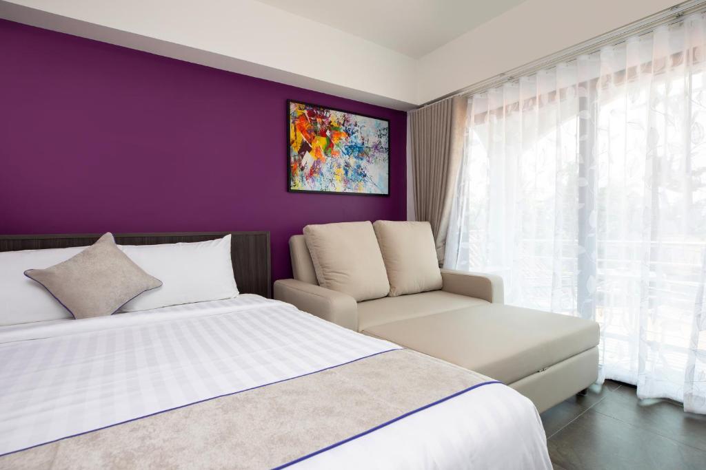 Postel nebo postele na pokoji v ubytování Aspira Resort Klong Muang Krabi