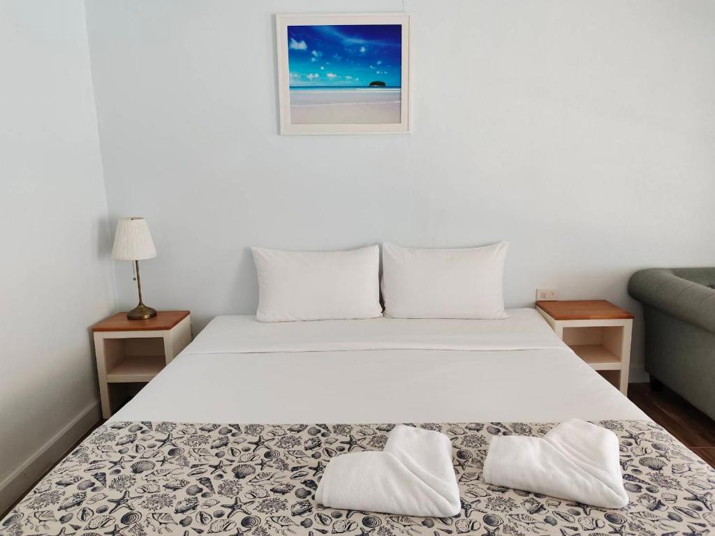 Postel nebo postele na pokoji v ubytování Blue Shore Cottage
