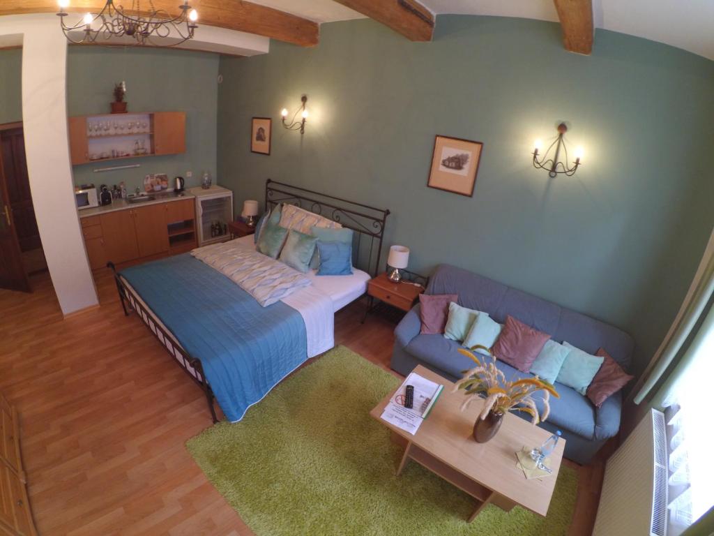 Postel nebo postele na pokoji v ubytování Hotel Atrium