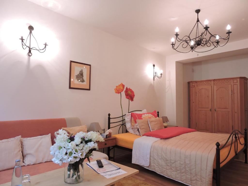 Postel nebo postele na pokoji v ubytování Hotel Atrium