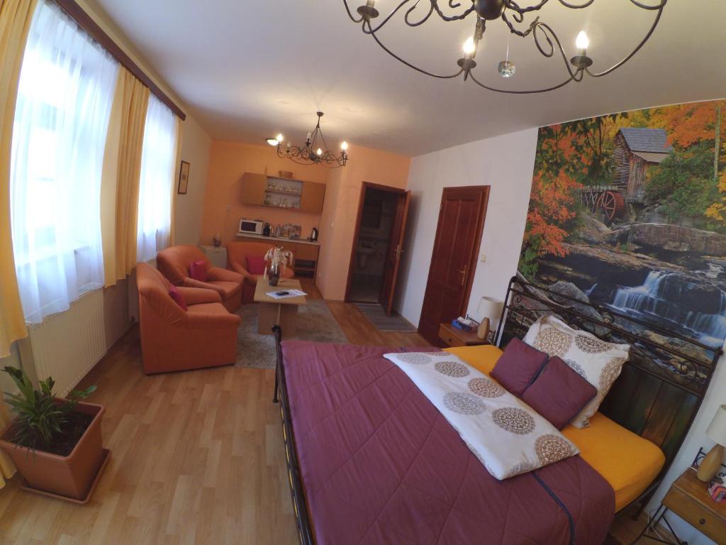 Postel nebo postele na pokoji v ubytování Hotel Atrium