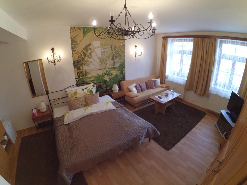 Postel nebo postele na pokoji v ubytování Hotel Atrium