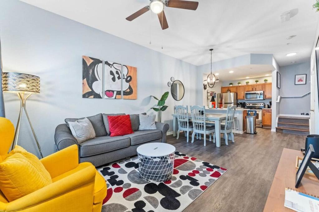 a living room with a couch and a table at 4005 SAN SABASTIAN DRIVE 3BED in Kissimmee