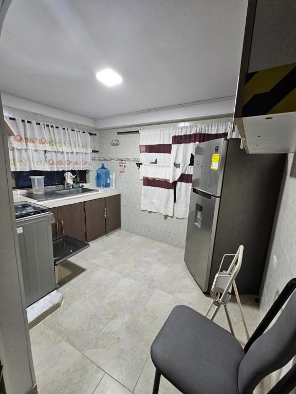 Kuchyň nebo kuchyňský kout v ubytování Hostal Shangiovys