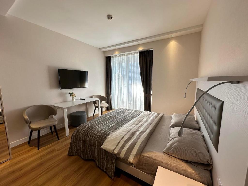 Postel nebo postele na pokoji v ubytování 5 Star Hotel Apartments