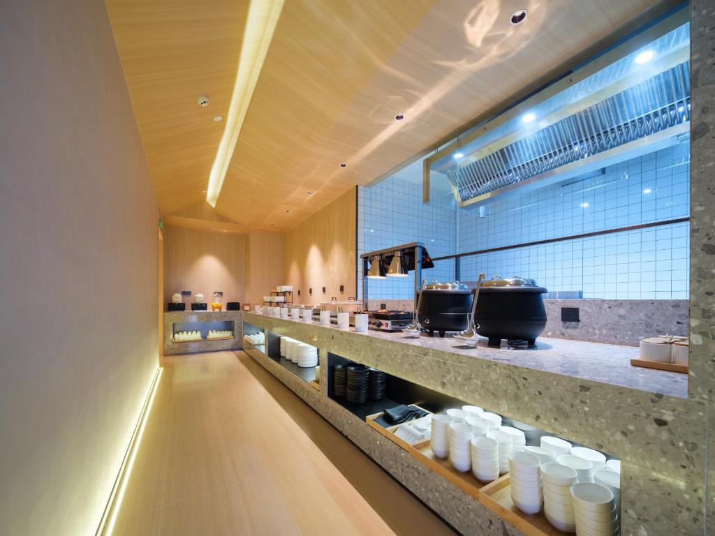 新乡桔作酒店 新乡东站市政府店的相册照片