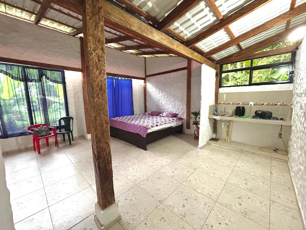 Voodi või voodid majutusasutuse Villa Lupita toas