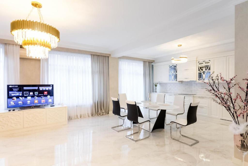 TV a/nebo společenská místnost v ubytování Central Elegant Apartment