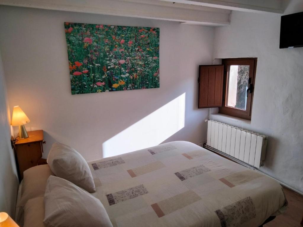 Postel nebo postele na pokoji v ubytování Casa Carlota