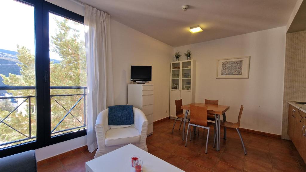 Telewizja i/lub zestaw kina domowego w obiekcie IMEDA Apartamentos MONTE GORBEA