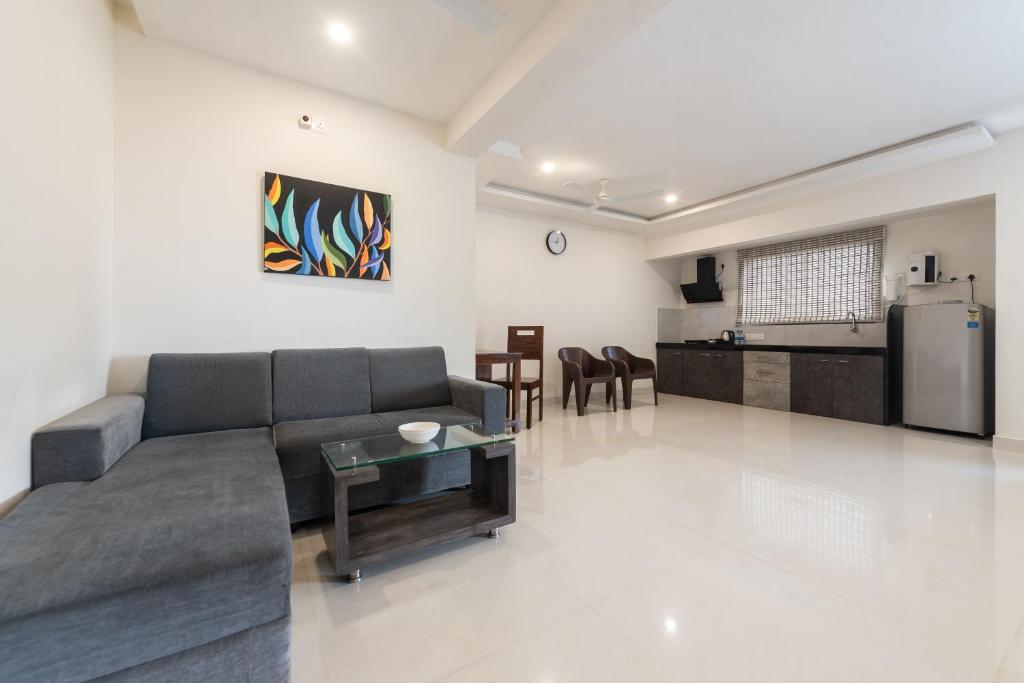Kuchyň nebo kuchyňský kout v ubytování Manipal Atalia Service Apartments