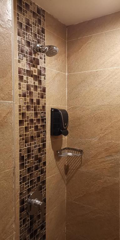 Koupelna v ubytování NU Hotel
