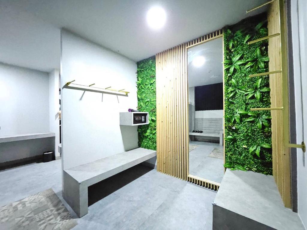 Postel nebo postele na pokoji v ubytování Little Loft Hotel