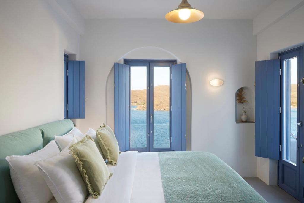 Postel nebo postele na pokoji v ubytování Kea Mare LV Villas