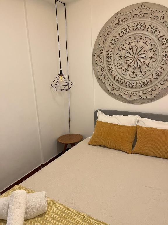 Postel nebo postele na pokoji v ubytování Regueira Gold com terraço