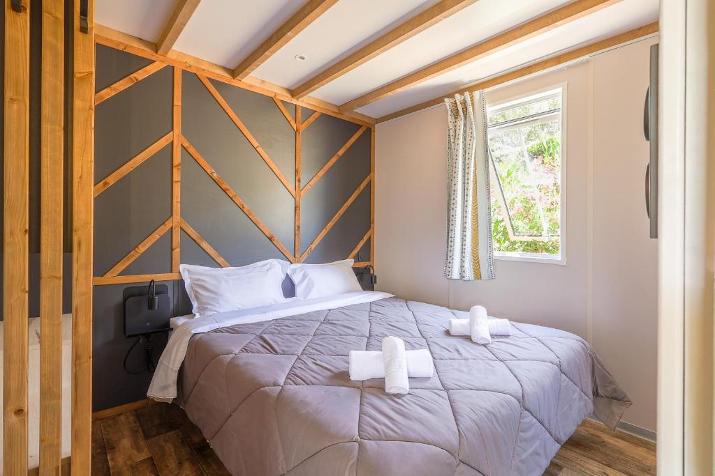 Postel nebo postele na pokoji v ubytování Camping Sole Di Sari