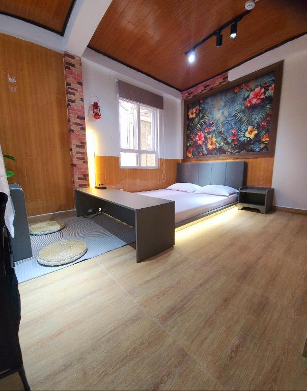 Postel nebo postele na pokoji v ubytování Bình Đào Hotel - Khách sạn ngay trung tâm giá rẻ