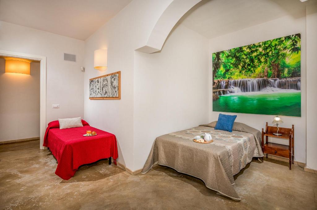 Posteľ alebo postele v izbe v ubytovaní CASALE DOME' 14&2, Emma Villas