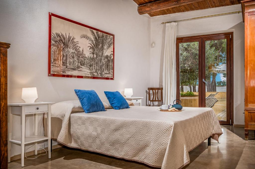 Posteľ alebo postele v izbe v ubytovaní CASALE DOME' 14&2, Emma Villas