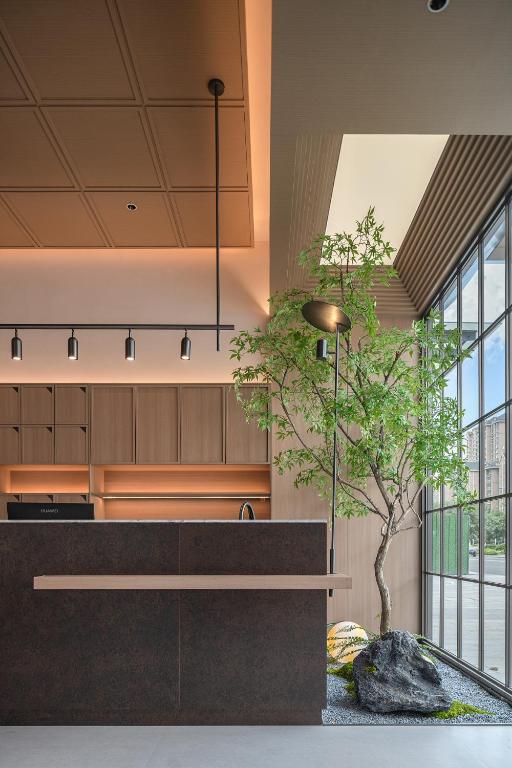 Gambar di galeri bagi 桔作酒店 许昌东站胖东来天使城店 di Xuchang
