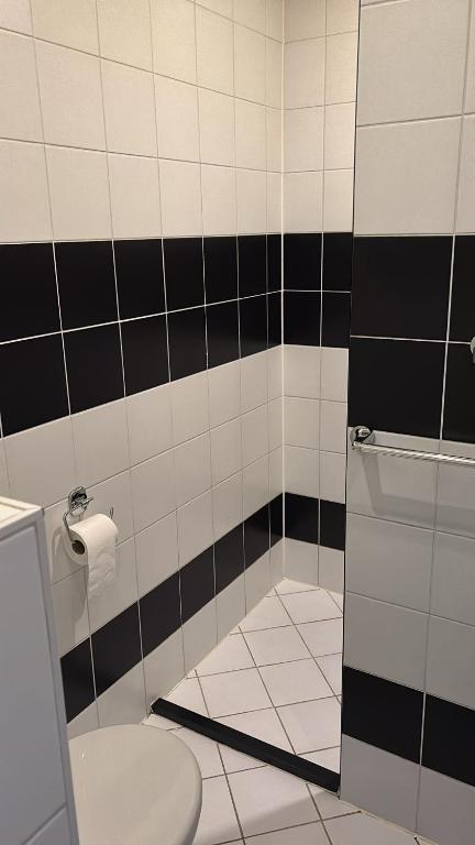Koupelna v ubytování Hotel Poseidon