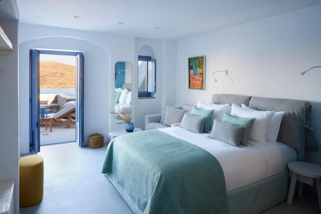 Postel nebo postele na pokoji v ubytování Kea Mare LV Villas
