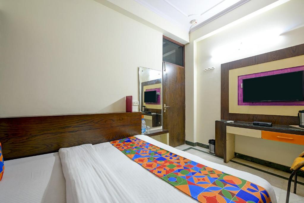 Postel nebo postele na pokoji v ubytování Hotel Paradise - New Delhi