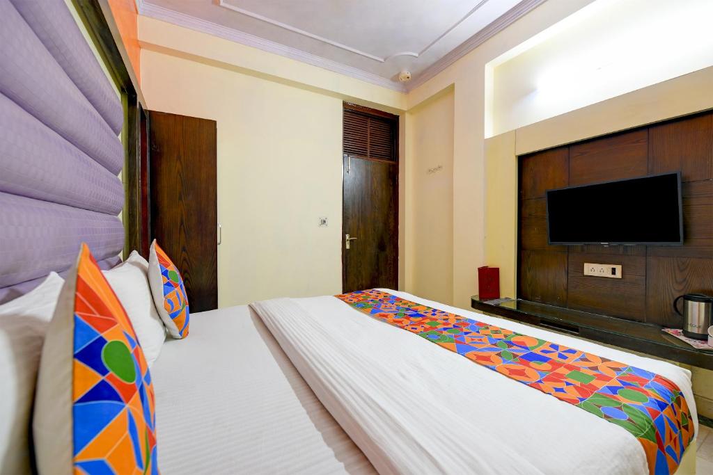 Postel nebo postele na pokoji v ubytování Hotel Paradise - New Delhi