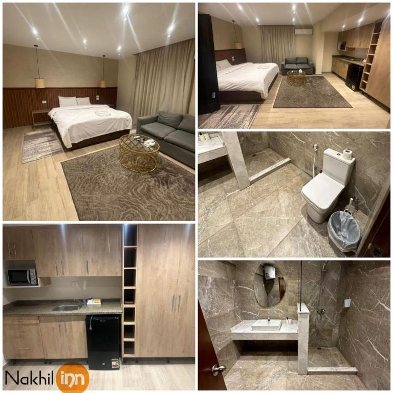 Postel nebo postele na pokoji v ubytování Nakhil Inn Residence