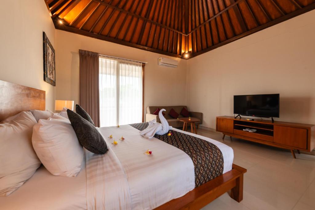 TV a/nebo společenská místnost v ubytování Bali Ayu Hotel & Villas