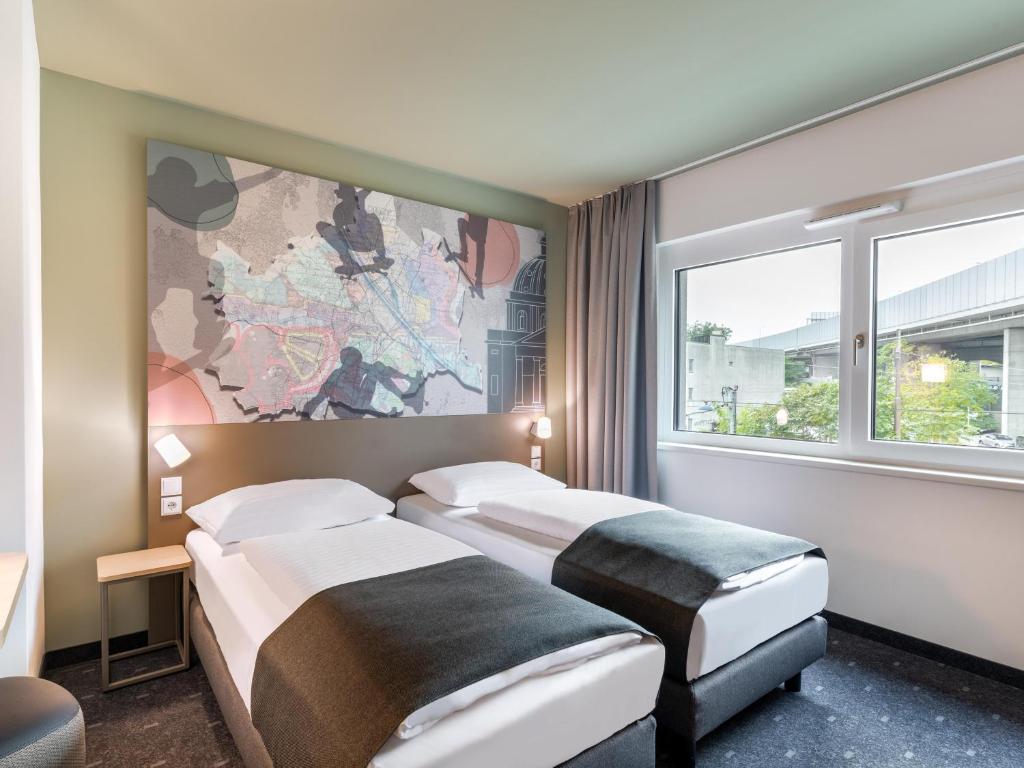 Postel nebo postele na pokoji v ubytování B&B HOTEL Wien-St-Marx