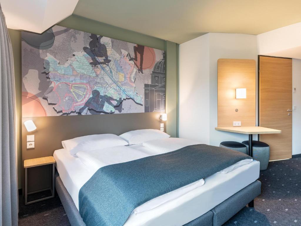 Postel nebo postele na pokoji v ubytování B&B HOTEL Wien-St-Marx