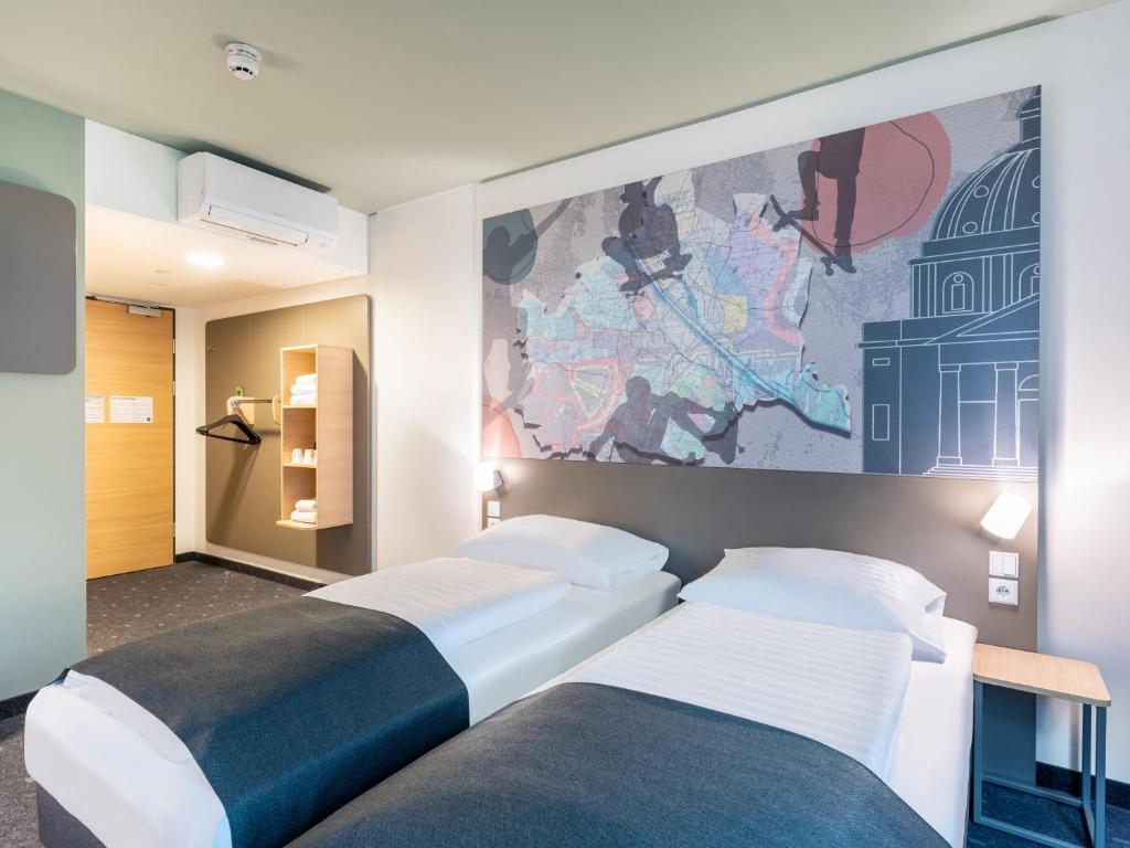Postel nebo postele na pokoji v ubytování B&B HOTEL Wien-St-Marx