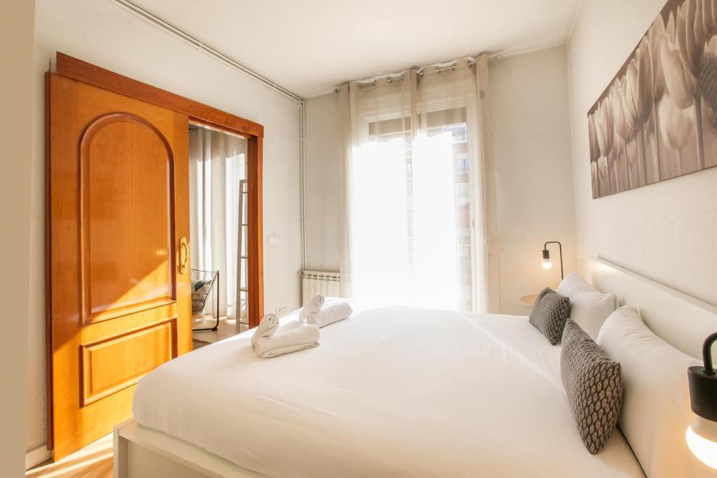 Posteľ alebo postele v izbe v ubytovaní 42ara1026 - Spacious apartment in Eixample