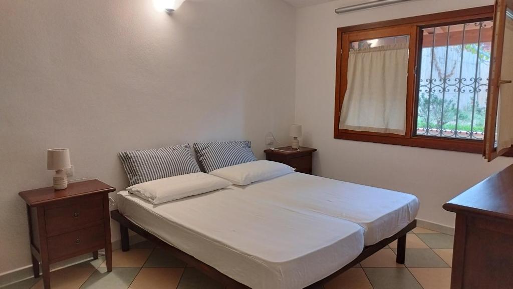 Posteľ alebo postele v izbe v ubytovaní Casa Olivo Le ginestre