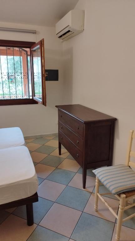 Posteľ alebo postele v izbe v ubytovaní Casa Olivo Le ginestre