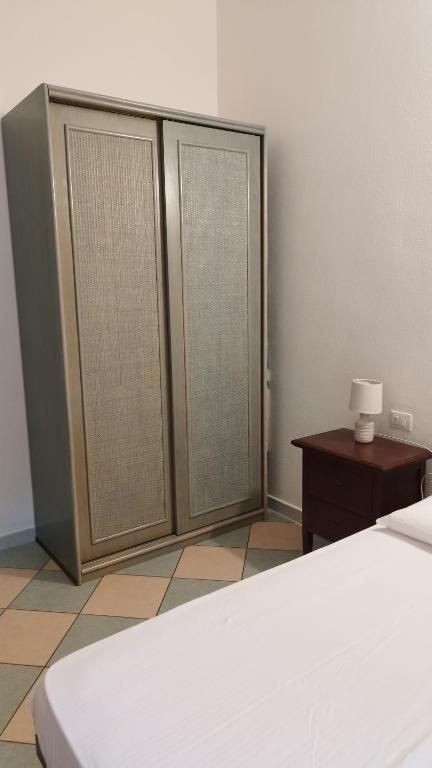 Posteľ alebo postele v izbe v ubytovaní Casa Olivo Le ginestre