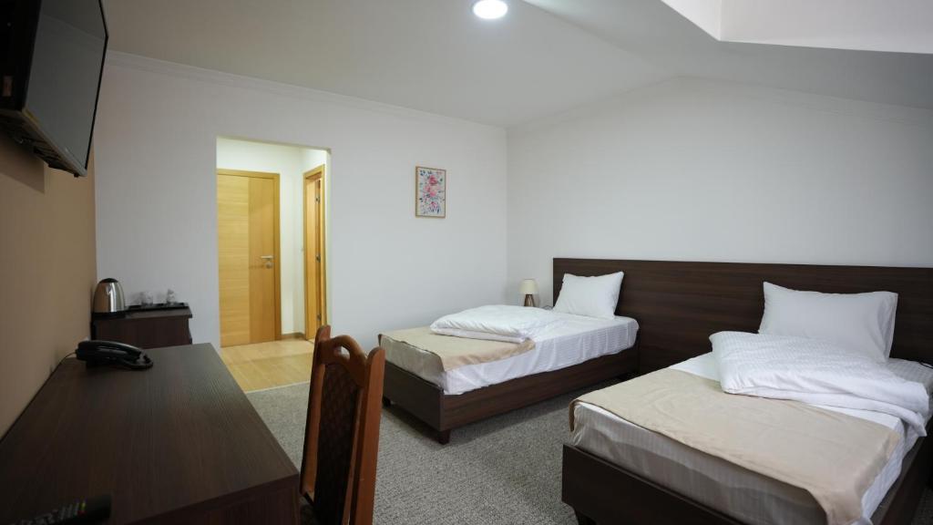 Voodi või voodid majutusasutuse Motel "Izvor Bosne" toas