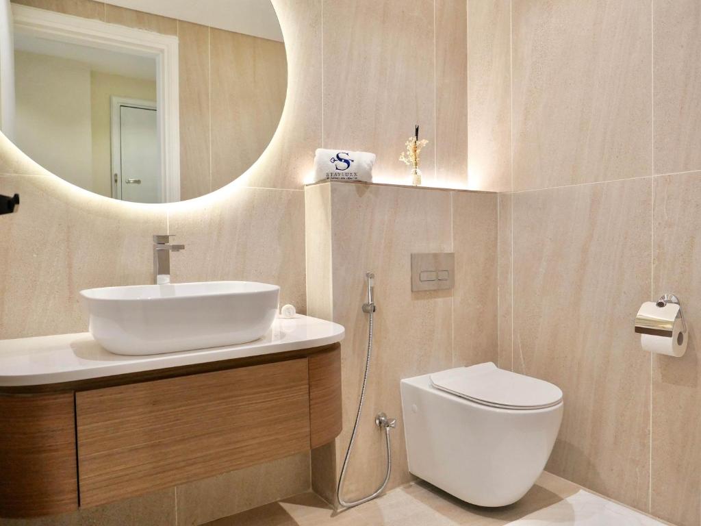 O baie la Ambient 1BR Apartment On The Beach at 5 Star Resort
