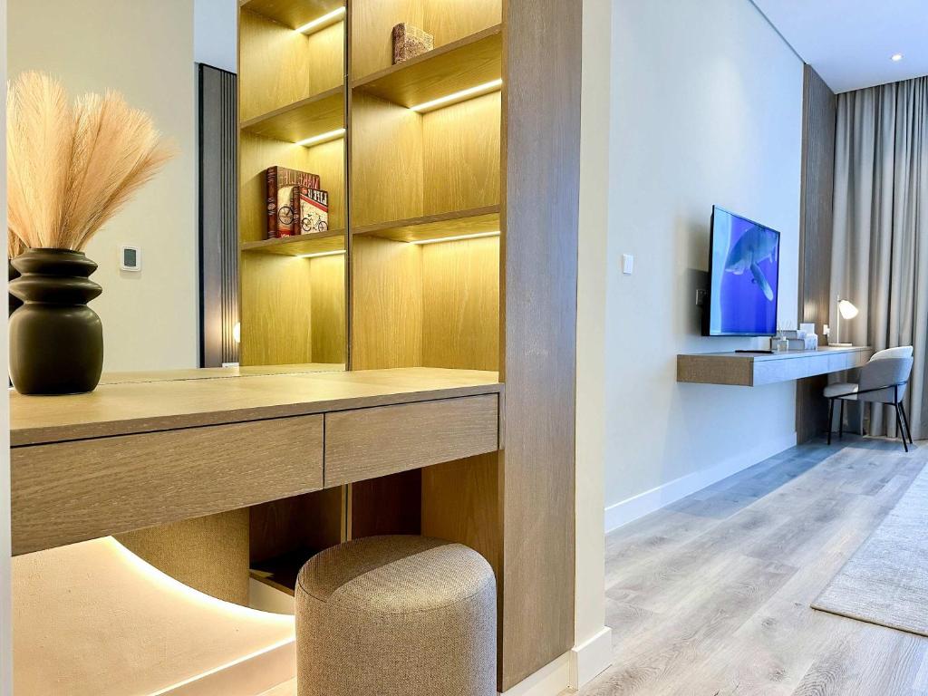 a home office with a desk and a chair at Renovated Marina view apartment in Oceana in Dubai