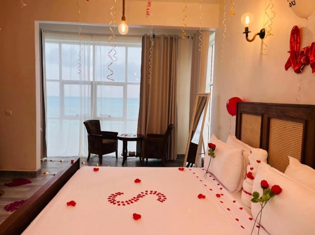 Postel nebo postele na pokoji v ubytování Mia Boutique Hotel