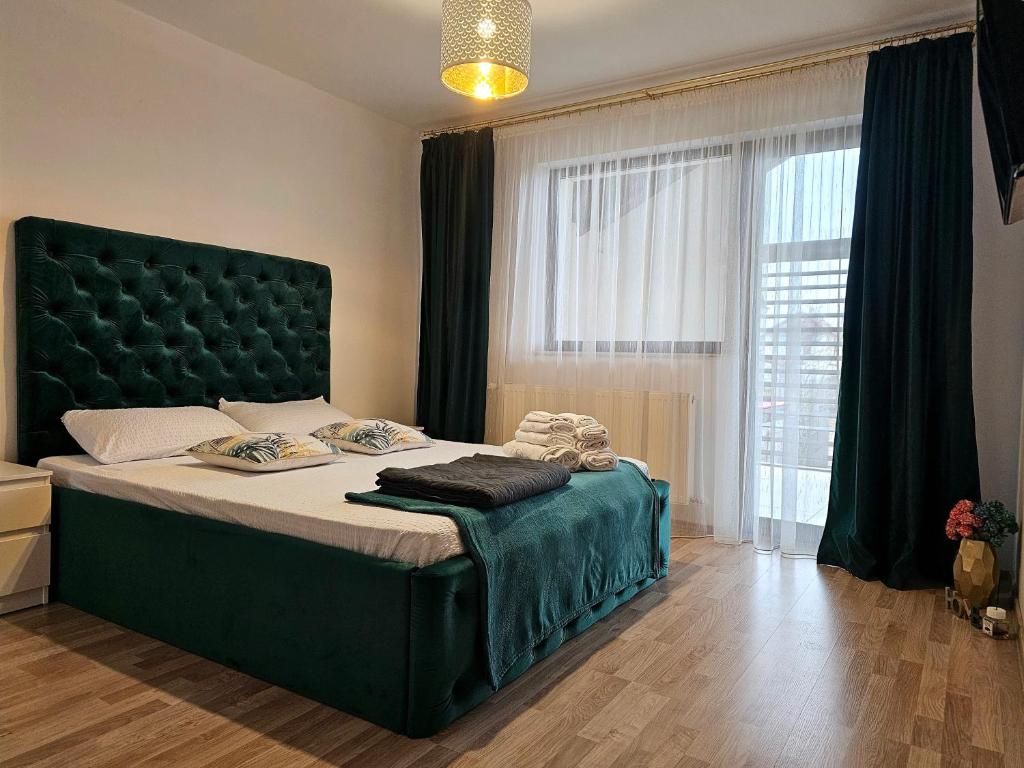 Postel nebo postele na pokoji v ubytování Pitesti House